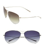 Sporty, double-bridge, semi-rimless titanium sunglass is crafted with lightweight titanium temples and metal front in a classic aviator shape. Available in gold with olive gradient lens and silver with grey gradient lens. Silicone nose pads Temple tips provide additional comfort and fit Gradient lenses are a six-base lens curve 100% UV protection Imported