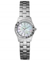 Sweet sparkle adorns this classic, ladylike watch from GUESS.