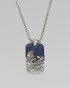 A contemporary dog tag design set in sterling silver and sapphire.SapphireSterling silverLength, about 22Imported
