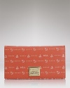 Stow away you essentials in this nautically-inspired wallet from Lauren Ralph Lauren. With plenty of pockets and a slim silhouette, it perfects on-the-go style whether you're on land or out to sea.