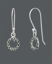 Let sparkle come full circle in this shapely design by Genevieve & Grace. Mini cut-out circles shine with the addition of glittering marcasite. Set in sterling silver. Approximate drop: 1 inch. Let sparkle come full circle in this shapely design by Genevieve & Grace. Mini cut-out circles shine with the addition of glittering marcasite. Set in sterling silver. Approximate drop: 1 inch.