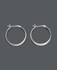 Like the little black dress of jewelry, you can never go wrong with a sophisticated pair of hoops. These large hoop earrings feature a smooth, round, sterling silver design. Approximate diameter: 1-1/5 inches. Like the little black dress of jewelry, you can never go wrong with a sophisticated pair of hoops. These large hoop earrings feature a smooth, round, sterling silver design. Approximate diameter: 1-1/5 inches.