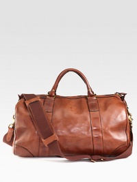 Invoking the classic feel of gentlemen's vintage sporting holdalls, an essential gym bag is crafted from sturdy leather with an embossed signature luggage tag for timeless style.Zip closureDouble top handlesAdjustable, removable shoulder strapInterior zip pocketEmbossed signature leather luggage tagLeather20W x 12H x 7DImported Invoking the classic feel of gentlemen's vintage sporting holdalls, an essential gym bag is crafted from sturdy leather with an embossed signature luggage tag for timeless style.Zip closureDouble top handlesAdjustable, removable shoulder strapInterior zip pocketEmbossed signature leather luggage tagLeather20W x 12H x 7DImported