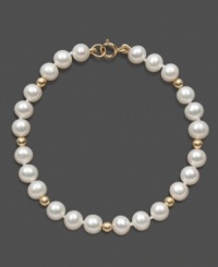 The perfect strand of pearls for a special little girl. This children's bracelet features cultured freshwater pearls (5-6 mm) and 14k gold bead accents in a 14k gold setting. Approximate length: 6 inches. The perfect strand of pearls for a special little girl. This children's bracelet features cultured freshwater pearls (5-6 mm) and 14k gold bead accents in a 14k gold setting. Approximate length: 6 inches.