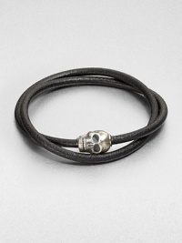 Silver skull accent joins together a double strand of smooth, genuine leather.LeatherSterling silverAbout 2½ diam.Made in the United Kingdom Silver skull accent joins together a double strand of smooth, genuine leather.LeatherSterling silverAbout 2½ diam.Made in the United Kingdom