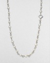 From the Bijoux Collection. A textured chain of sterling silver is illuminated by glistening pearls; wear it long or doubled-up for ultimate versatility.Cultured freshwater, naturally colored pearls Sterling silver Chain length, about 40 Toggle clasp Imported