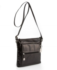 Giani Bernini's slim, compact crossbody bag is a sophisticated way to stay organized on busy days. Giani Bernini's slim, compact crossbody bag is a sophisticated way to stay organized on busy days.
