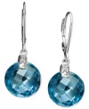 Make a vibrant statement with earrings as blue as the Caribbean. Large blue topaz gemstones (11 ct. t.w.) are accented with diamonds and set in 14k white gold. Approximate drop: 1 inch.