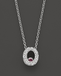 From the Tiny Treasures collection, a diamond O necklace. With signature ruby accent. Designed by Roberto Coin. From the Tiny Treasures collection, a diamond O necklace. With signature ruby accent. Designed by Roberto Coin.