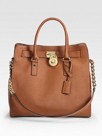 A structured design in luxurious leather with chic, signature hardware accents.Double top handles, 4¾ dropChain and leather shoulder strap, 12½ dropMagnetic snap closureProtective metal feetOne inside zip pocketFour inside open pocketsOne key hookCotton lining14¼W X 13H X 5½DImported A structured design in luxurious leather with chic, signature hardware accents.Double top handles, 4¾ dropChain and leather shoulder strap, 12½ dropMagnetic snap closureProtective metal feetOne inside zip pocketFour inside open pocketsOne key hookCotton lining14¼W X 13H X 5½DImported