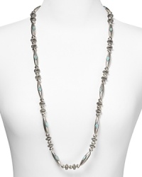 Lauren Ralph Lauren pays homage to Southwestern style with this beaded necklace, accented by an evocative mix of textured silver and turquoise beads. Lauren Ralph Lauren pays homage to Southwestern style with this beaded necklace, accented by an evocative mix of textured silver and turquoise beads.