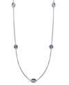 A modern update. This delicate long sterling silver necklace adds just the right pop of color with oval and round-cut amethyst stations (12 ct. t.w.). Secures with a lobster claw clasp. Approximate length: 36 inches.