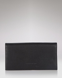 A classic bifold wallet in pebbled leather from Longchamp.