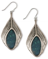 Accent your everyday with some southwestern style. Semi-precious turquoise stones complement the feather design of these delightful drop earrings from Lucky Brand. Crafted in silver tone mixed metal. Approximate drop: 1-1/2 inches. Accent your everyday with some southwestern style. Semi-precious turquoise stones complement the feather design of these delightful drop earrings from Lucky Brand. Crafted in silver tone mixed metal. Approximate drop: 1-1/2 inches.