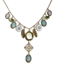 Well aren't you charming? Pull out all the stops in Lucky Brand's garden-themed charm necklace. Intricate cut-out flowers and filigree charms combine with bezel-set plastic and epoxy stones. Crafted in gold and silver tone mixed metal. Approximate length: 20 inches. Approximate drop: 2-3/4 inches. Well aren't you charming? Pull out all the stops in Lucky Brand's garden-themed charm necklace. Intricate cut-out flowers and filigree charms combine with bezel-set plastic and epoxy stones. Crafted in gold and silver tone mixed metal. Approximate length: 20 inches. Approximate drop: 2-3/4 inches.