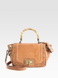 A bamboo top handle and polished studs are the perfect finishing touches on this structured shape of snake-embossed leather. Bamboo top handle, 4½ dropTurn-lock flap closureLeather shoulder strap, 20 dropOne outside open pocketProtective metal feetOne inside zip pocketOne inside open pocketFully lined10W X 7½H X 3½DImported A bamboo top handle and polished studs are the perfect finishing touches on this structured shape of snake-embossed leather. Bamboo top handle, 4½ dropTurn-lock flap closureLeather shoulder strap, 20 dropOne outside open pocketProtective metal feetOne inside zip pocketOne inside open pocketFully lined10W X 7½H X 3½DImported