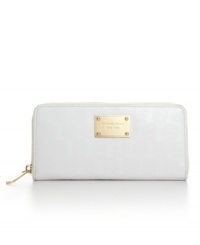 Stick to the classics with this timeless wallet by MICHAEL Michael Kors. With polished hardware, a signature front plaque and an easy access zip around design, this organized style will last you for seasons to come. Stick to the classics with this timeless wallet by MICHAEL Michael Kors. With polished hardware, a signature front plaque and an easy access zip around design, this organized style will last you for seasons to come.