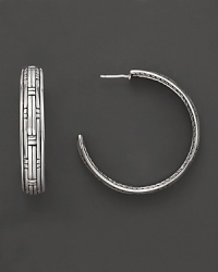 John Hardy's chic hoop earring is crafted from sterling silver and features a polished basket-weave pattern. Designed by John Hardy. John Hardy's chic hoop earring is crafted from sterling silver and features a polished basket-weave pattern. Designed by John Hardy.