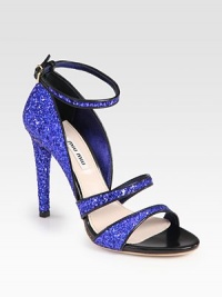 Glittered leather silhouette with smooth leather trim and an adjustable ankle strap. Glittered leather heel, 4 (100mm)Glittered leather upperLeather lining and solePadded insoleMade in ItalyOUR FIT MODEL RECOMMENDS ordering one size up as this style runs small. Glittered leather silhouette with smooth leather trim and an adjustable ankle strap. Glittered leather heel, 4 (100mm)Glittered leather upperLeather lining and solePadded insoleMade in ItalyOUR FIT MODEL RECOMMENDS ordering one size up as this style runs small.