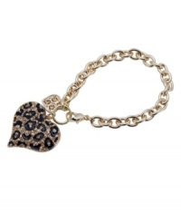 Perfect for prowling. This fierce style from GUESS features a leopard print heart in black enamel and crystal. Setting and cable chain crafted in gold tone mixed metal. Approximate length: 7-1/2 inches. Perfect for prowling. This fierce style from GUESS features a leopard print heart in black enamel and crystal. Setting and cable chain crafted in gold tone mixed metal. Approximate length: 7-1/2 inches.
