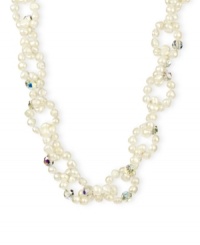 Go for a subtle hint of shimmer. This beautiful necklace highlights cultured freshwater pearls and sparkling Swarovski crystal accents. Set in sterling silver. Approximate length: 16 inches + 2-inch extender. Go for a subtle hint of shimmer. This beautiful necklace highlights cultured freshwater pearls and sparkling Swarovski crystal accents. Set in sterling silver. Approximate length: 16 inches + 2-inch extender.