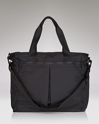 A durable nylon baby bag with changing pad from LeSportsac. A durable nylon baby bag with changing pad from LeSportsac.