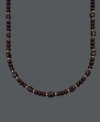 Sophistication in rich red hues. Set off your look with this beautiful necklace highlighting 6 millimeter and 6 x 8 millimeter garnet beads (150 ct. t.w.) and 14k gold accent beads and clasp. Approximate length: 18 inches.