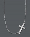 A modern update on the traditional cross. Studio Silver adds a simple twist by turning a symbolic cross pendant on its side. Crafted in sterling silver with a light reflecting diamond-cut surface and rhodium plating to prevent tarnishing. Approximate length: 16 inches + 2-inch extender. Approximate drop: 1/2 inch.