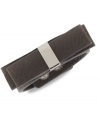 BCBGeneration makes a subtle, but bold statement with this snap bracelet. Crafted from gunmetal- and silver-tone mixed metal, the bracelet features a bow on top for a fashionable touch. Approximate length: 8 inches.