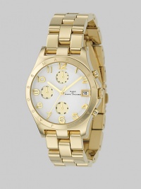 Boyfriend-inspired, oversized design of gold IP stainles steel with rounded number markers for a touch of whimsy. Japanese analog movement Water-resistant to 3 ATM Gold IP (ionic plating) stainless steel round case, 38mm (1.50) White dial Three chronograph sub dials Arabic and index markers Date display at 3 o'clock Second hand Bracelet, 18mm (0.71) Imported Boyfriend-inspired, oversized design of gold IP stainles steel with rounded number markers for a touch of whimsy. Japanese analog movement Water-resistant to 3 ATM Gold IP (ionic plating) stainless steel round case, 38mm (1.50) White dial Three chronograph sub dials Arabic and index markers Date display at 3 o'clock Second hand Bracelet, 18mm (0.71) Imported