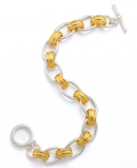 Simple yet splendid, this Lauren by Ralph Lauren bracelet is crafted in silvertone and goldtone mixed metal. Approximate length: 7 inches. Simple yet splendid, this Lauren by Ralph Lauren bracelet is crafted in silvertone and goldtone mixed metal. Approximate length: 7 inches.