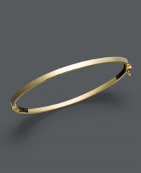 A simple luxury when worn solo, a must-have trend when stacked with others. Bangle features a tube shape crafted in 14k gold. Approximate diameter: 2-3/8 inches. A simple luxury when worn solo, a must-have trend when stacked with others. Bangle features a tube shape crafted in 14k gold. Approximate diameter: 2-3/8 inches.