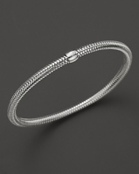 A modern mesh bangle in 18K white gold from Roberto Coin. A modern mesh bangle in 18K white gold from Roberto Coin.