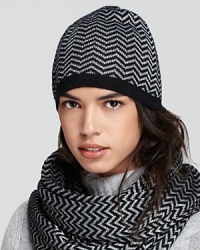 Achieve rock-star status in Aqua's sparkly, zig-zag printed skull cap with woven metallic threads. Achieve rock-star status in Aqua's sparkly, zig-zag printed skull cap with woven metallic threads.