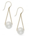 Contemporary chic. Delicate chains cradle a cultured freshwater pearl (10 mm) in this shapely style. Set in 14k gold. Approximate drop: 1-1/2 inches.