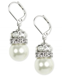 Elegance to last through the ages. Givenchy's sophisticated drop earrings feature polished glass pearls and sparkling crystals. Crafted in silver tone mixed metal. Approximate drop: 1-1/2 inches. Elegance to last through the ages. Givenchy's sophisticated drop earrings feature polished glass pearls and sparkling crystals. Crafted in silver tone mixed metal. Approximate drop: 1-1/2 inches.