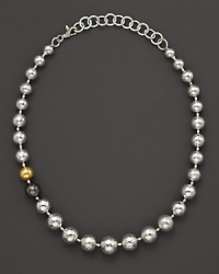 Warm up your look this season in Gurhan's balloon necklace, crafted from hammered orbs in white silver, dark silver and gleaming 24 Kt. yellow gold. Warm up your look this season in Gurhan's balloon necklace, crafted from hammered orbs in white silver, dark silver and gleaming 24 Kt. yellow gold.