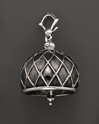 Inspired by Zen philosophy, this intricately detailed, blackened and polished sterling silver meditation bell from Paul Morelli jingles softly.