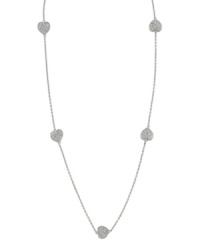 This CRISLU necklace paves the pathway to love with beautiful hearts featuring round-cut cubic zirconias (1-3/4 ct. t.w.). Set in sterling silver with a platinum finish. Approximate length: 16 inches + 2-inch extender. This CRISLU necklace paves the pathway to love with beautiful hearts featuring round-cut cubic zirconias (1-3/4 ct. t.w.). Set in sterling silver with a platinum finish. Approximate length: 16 inches + 2-inch extender.