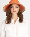 This dramatic, packable straw topper features signature logo rivets, elasticized inner band and an oversized, sloped brim for maximum sun protection and style.Brim, about 4.25Elasticized inner band fits most95% UVA/UVB protectionPolypropylene/polyesterSpot cleanImported and hand-finished in the USA