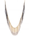 Fringe benefits. With this stylish long statement necklace, Kenneth Cole New York conveys boho chic at its best! Crafted in gold tone mixed metal, it's elaborately embellished with chains and silver tone faceted glass beading. Approximate length: 34 inches. Approximate drop: 2-3/4 inches.