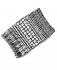 Both bold and beautiful, Kenneth Cole New York's segmented stretch bracelet is crafted from hematite-tone mixed metal. Glass opal-colored crystal pave accents provide the perfect amount of sparkle. Approximate length: 7-1/2 inches. Both bold and beautiful, Kenneth Cole New York's segmented stretch bracelet is crafted from hematite-tone mixed metal. Glass opal-colored crystal pave accents provide the perfect amount of sparkle. Approximate length: 7-1/2 inches.