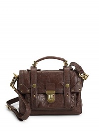 THE LOOKLock on front flapLeather top handleDetachable leather strapTwo interior zip pocketsFully linedTHE FIT9W X 5½H X 3DShoulder strap, about 23½-25Top handle drop, 3THE MATERIALLambskin leatherLining: cottonORIGINImported THE LOOKLock on front flapLeather top handleDetachable leather strapTwo interior zip pocketsFully linedTHE FIT9W X 5½H X 3DShoulder strap, about 23½-25Top handle drop, 3THE MATERIALLambskin leatherLining: cottonORIGINImported