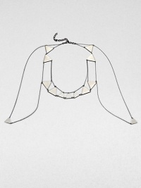 Much more than a necklace, this edgy design combines slender chains and simple triangles into striking, geometric body jewelry that goes around the neck, over the shoulders and around the arms, making a statement that's certain to get you noticed.Nickel-plated and hematite-plated brassPewter colorLength around neck, about 22-26 (adjustable)Armhole opening and drape, about 22Lobster claspMade in USA Much more than a necklace, this edgy design combines slender chains and simple triangles into striking, geometric body jewelry that goes around the neck, over the shoulders and around the arms, making a statement that's certain to get you noticed.Nickel-plated and hematite-plated brassPewter colorLength around neck, about 22-26 (adjustable)Armhole opening and drape, about 22Lobster claspMade in USA