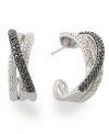 Crisscrossed and totally chic! These unique hoop earrings are highlighted by round-cut white diamonds (1/4 ct. t.w.) and black diamonds (1/4 ct. t.w.). Set in sterling silver. Approximate diameter: 3/4 inch.