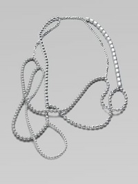 A versatile piece that features tonal strands of beads in an artfully asymmetrical style. Glass and acrylic beadsLength, about 52Slip-on styleImported A versatile piece that features tonal strands of beads in an artfully asymmetrical style. Glass and acrylic beadsLength, about 52Slip-on styleImported