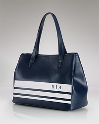 Lauren Ralph Lauren puts a sporty spin on the classic tote bag with bold stripes. A roomy interior and reinforced bottom ground this piece, making it a chic daytime choice. Lauren Ralph Lauren puts a sporty spin on the classic tote bag with bold stripes. A roomy interior and reinforced bottom ground this piece, making it a chic daytime choice.