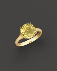 18K yellow gold is set with a faceted lemon quartz. 18K yellow gold is set with a faceted lemon quartz.