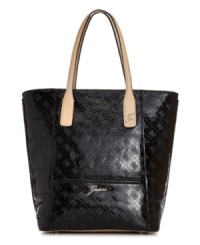 A pretty patent look that brings the shine. Rock this large tote design by GUESS featuring a signature embossed exterior and polished gold-tone hardware. A pretty patent look that brings the shine. Rock this large tote design by GUESS featuring a signature embossed exterior and polished gold-tone hardware.