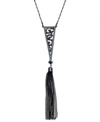 Ornate elegance. This Y-shaped necklace from GUESS is crafted from hematite-tone mixed metal with a glass crystal tassel and a filigree pattern for a refined touch. Approximate length: 18 inches + 2-inch extender. Approximate drop: 6-1/2 inches. Approximate diameter: 1/2 inch. Ornate elegance. This Y-shaped necklace from GUESS is crafted from hematite-tone mixed metal with a glass crystal tassel and a filigree pattern for a refined touch. Approximate length: 18 inches + 2-inch extender. Approximate drop: 6-1/2 inches. Approximate diameter: 1/2 inch.
